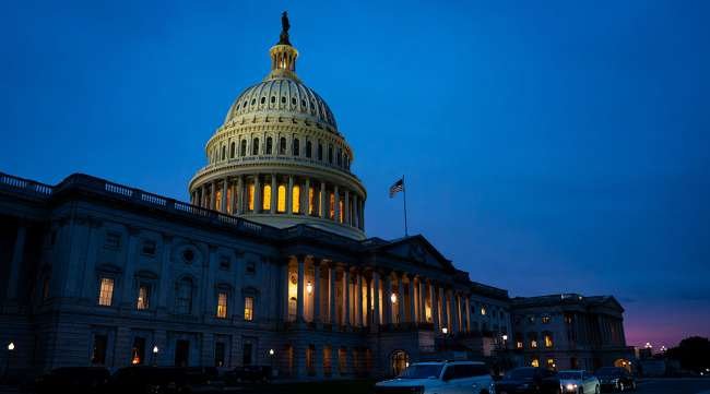 Trucks moving on U.S. highways during government shutdown 2025 while FAA faces worker furloughs